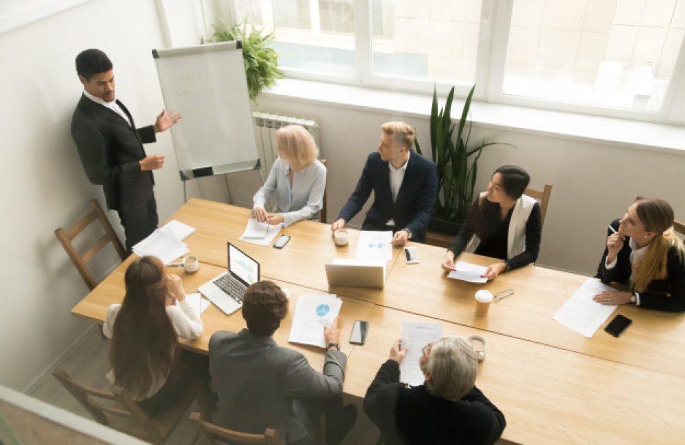 african-american-ceo-giving-presentation-corporate-team-meeting-concept_1163-4880